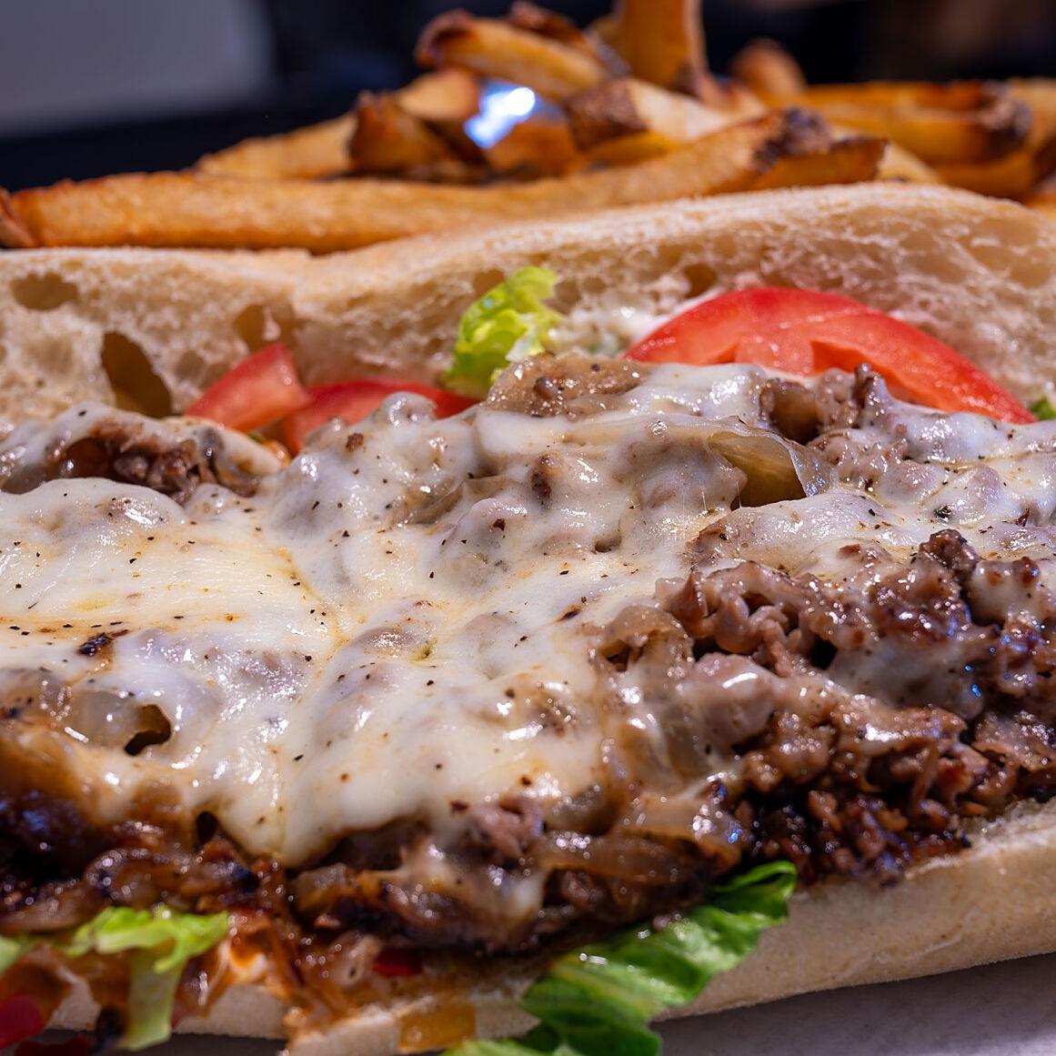 The Garage signature dishes Steak & CheeseBYO Pizza 18"Wings